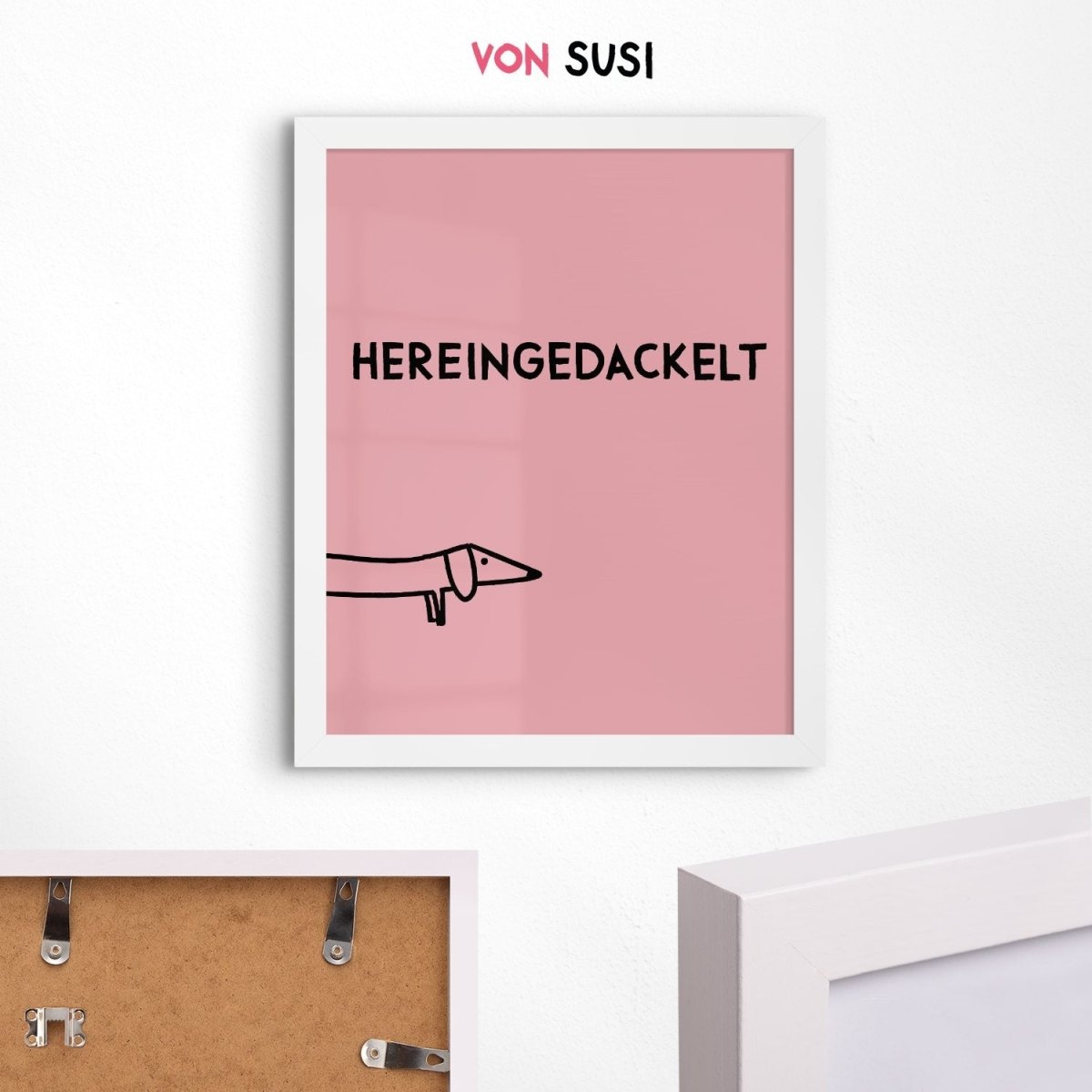 Hereingedackelt Poster in rosa im Holzrahmen weiß